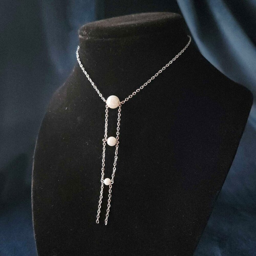 Unique elegant long pearl necklace with a small silver chain